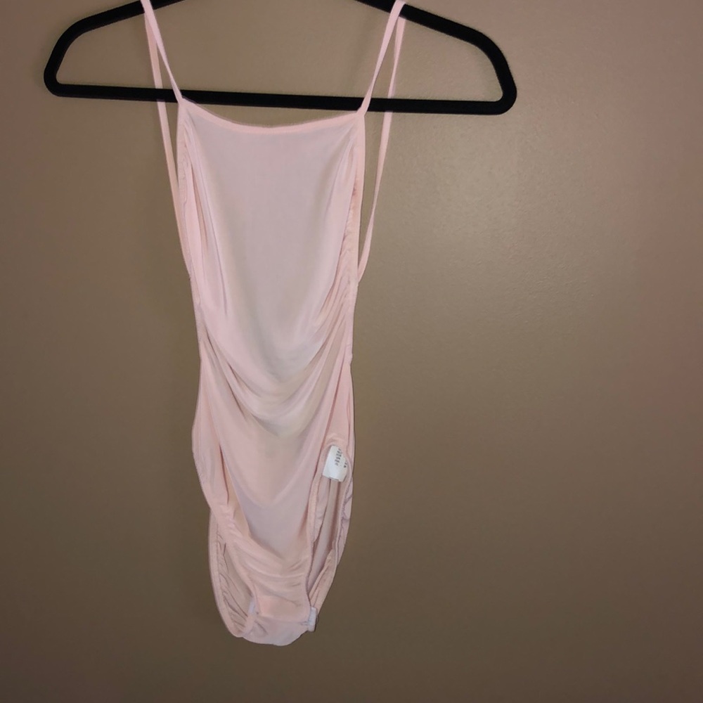 NW Woman’s Blush Pink Bodysuit